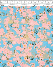Japanese chiyogami featuring pink plum blossoms and black plum blossom outines on a light blue background with metallic gold accents.