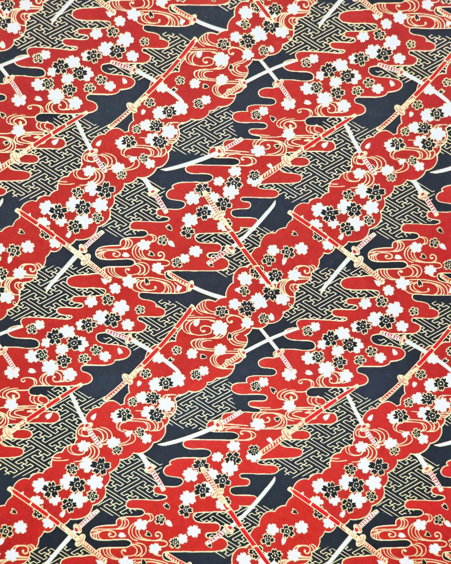 Japanese chiyogami paper featuring red & white katana swords with white & black cherry blossoms on a red & black background with metallic gold accents.