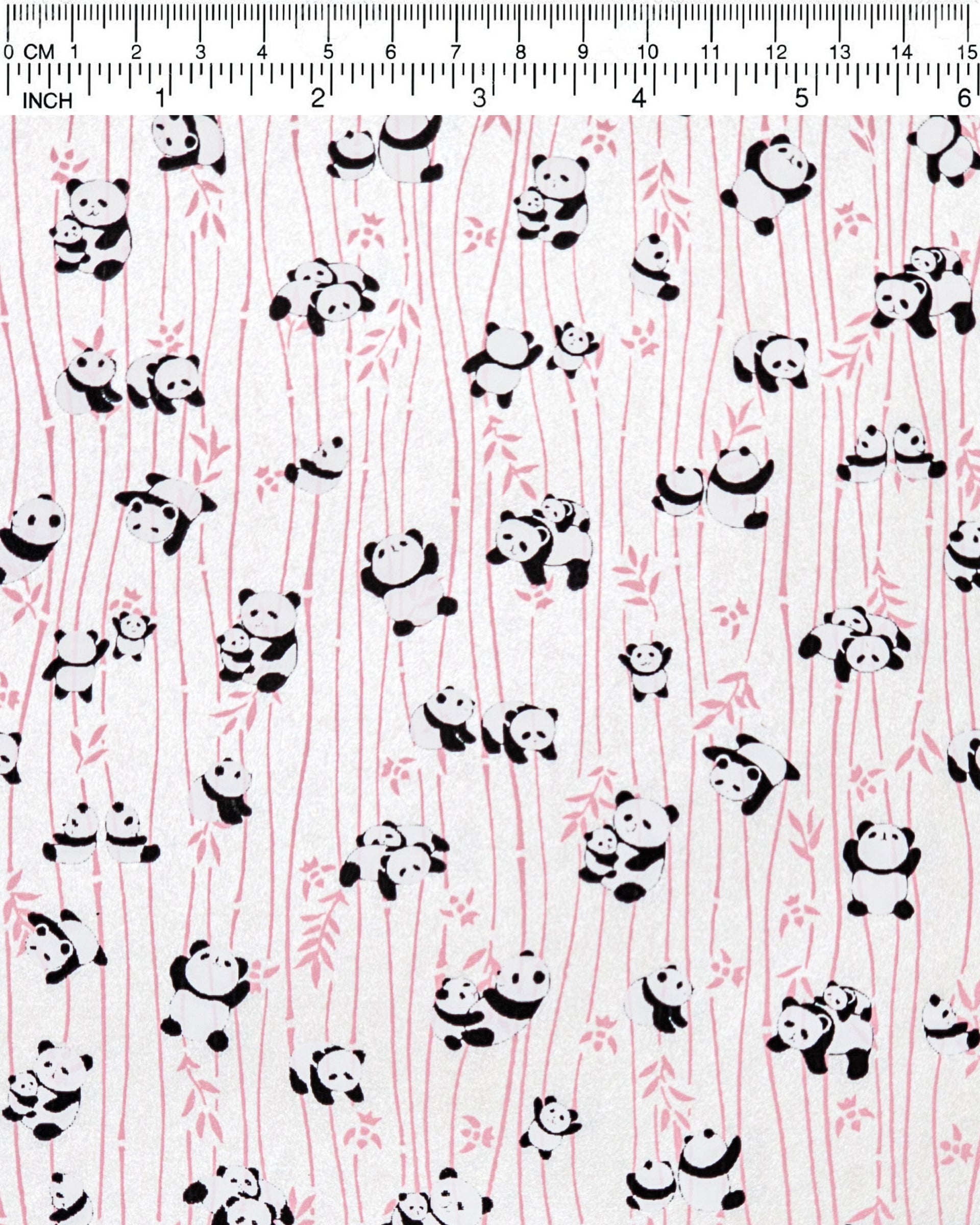 Japanese chiyogami paper featuring black & white pandas with pink bamboo on a pearlescent white background