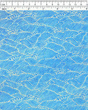 Japanese chiyogami paper featuring metallic gold waves on a royal blue background.
