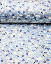 Japanese chiyogami paper featuring blue & white maples leaves on a light blue background with metallic gold accents.