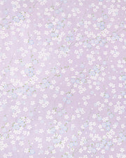 Japanese chiyogami paper featuring blue & white cherry blossoms on a pearlescent purple background.