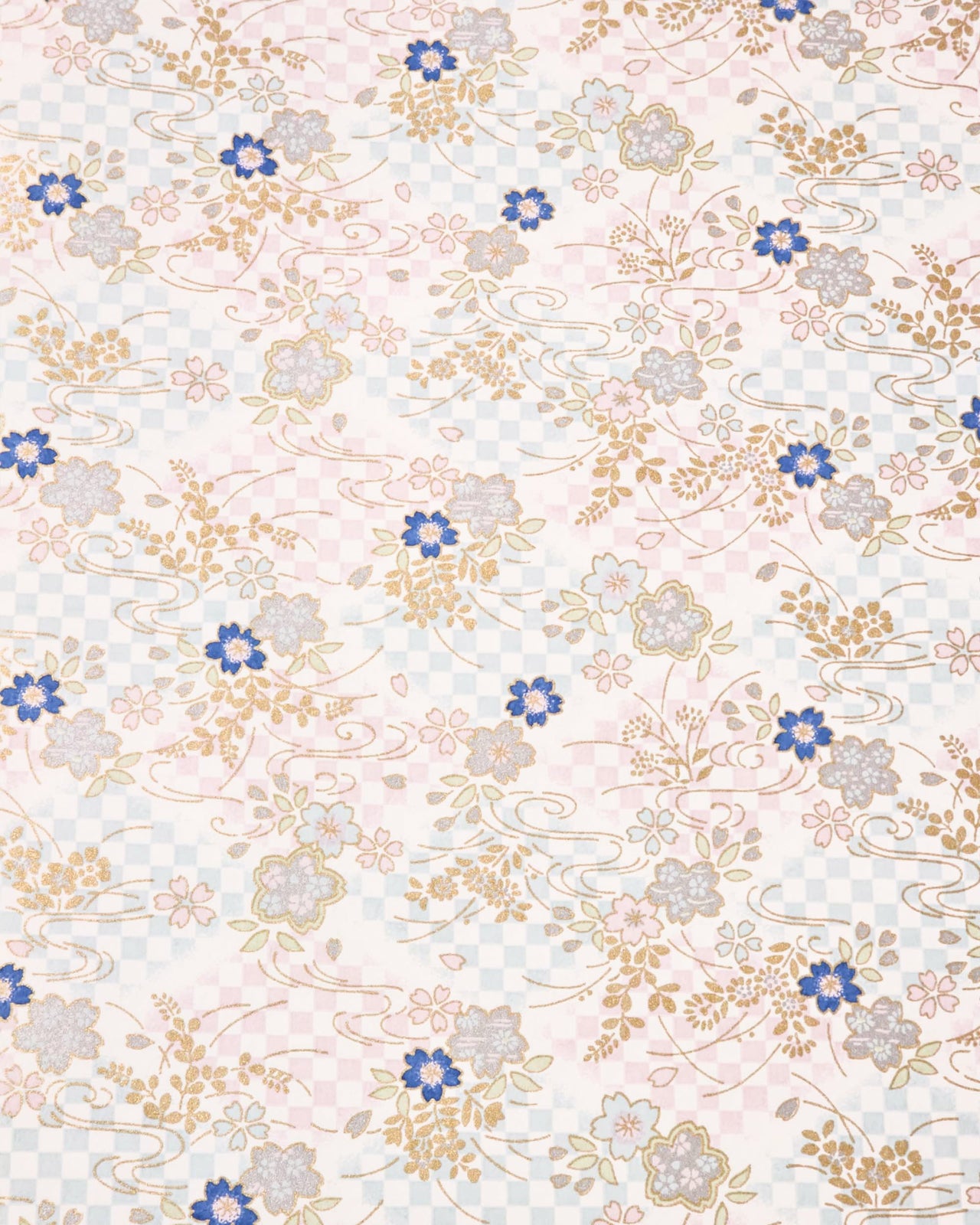 Japanese chiyogami paper featuring blue & pink cherry blossoms on a blue & purple ichimatsu (checkered) background with metallic gold & silver accents.