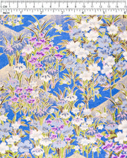 Japanese chiyogami paper featuring blue, purple, and white irises on a royal blue background with metallic gold accents.