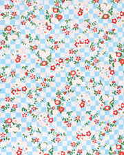 Japanese chiyogami paper featuring pink, red, and white flowers on a blue ichimatsu (checkered) background with metallic gold accents.