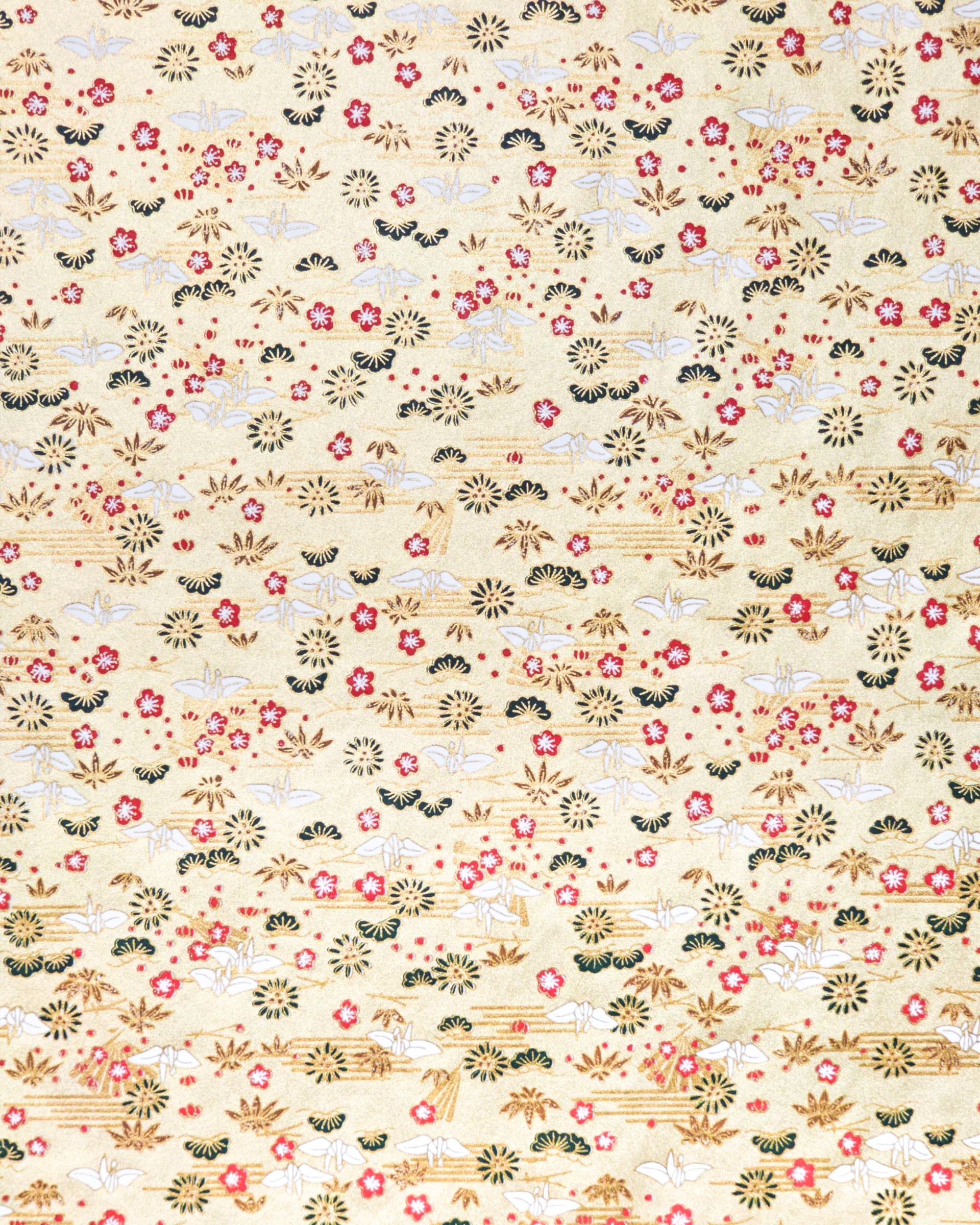 Japanese chiyogami featuring white origami cranes with green plants and red plum blossoms on a metallic gold background.