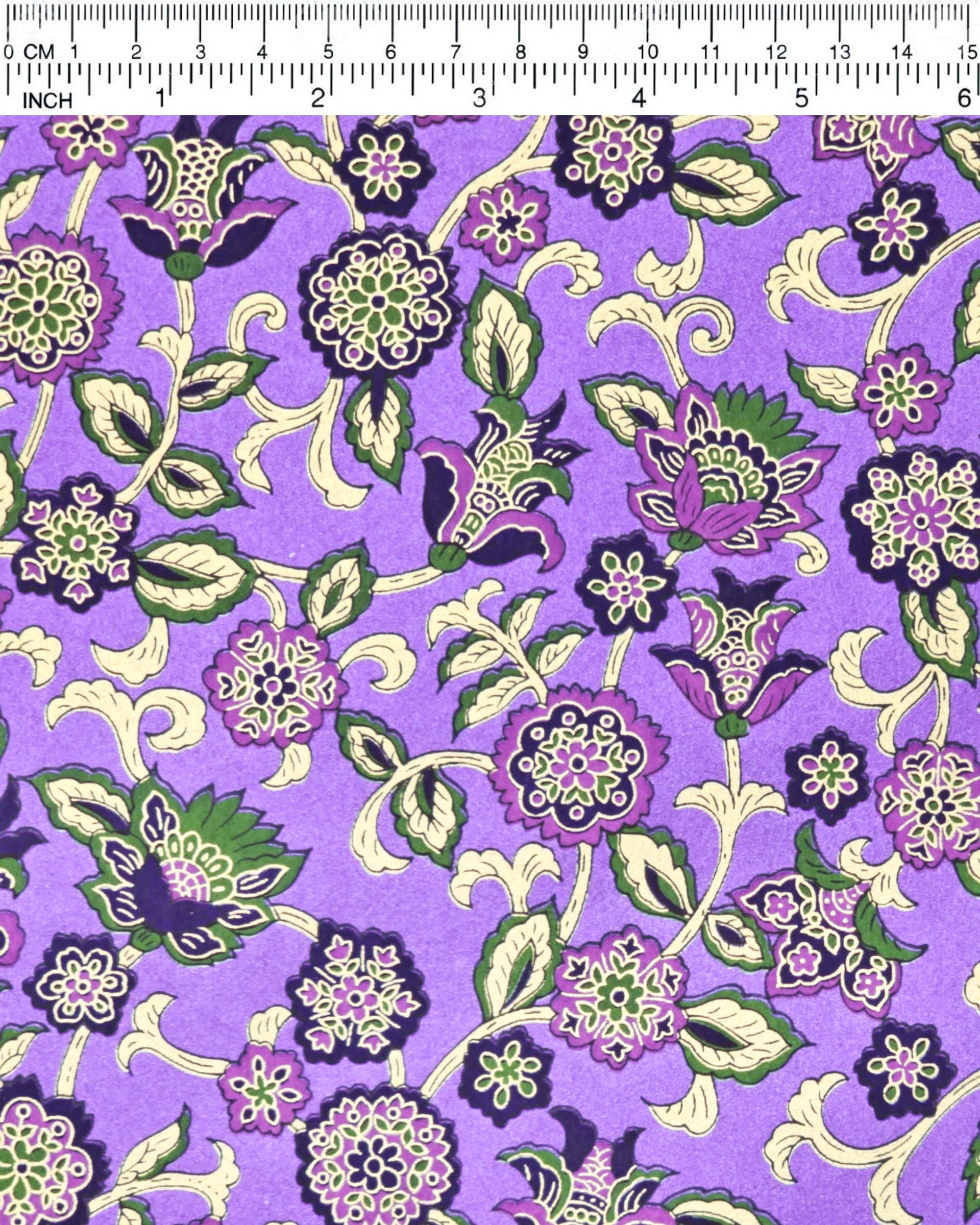 Japanese chiyogami featuring green & purple sarasa flowers on a pearlescent purple background with metallic gold accents.