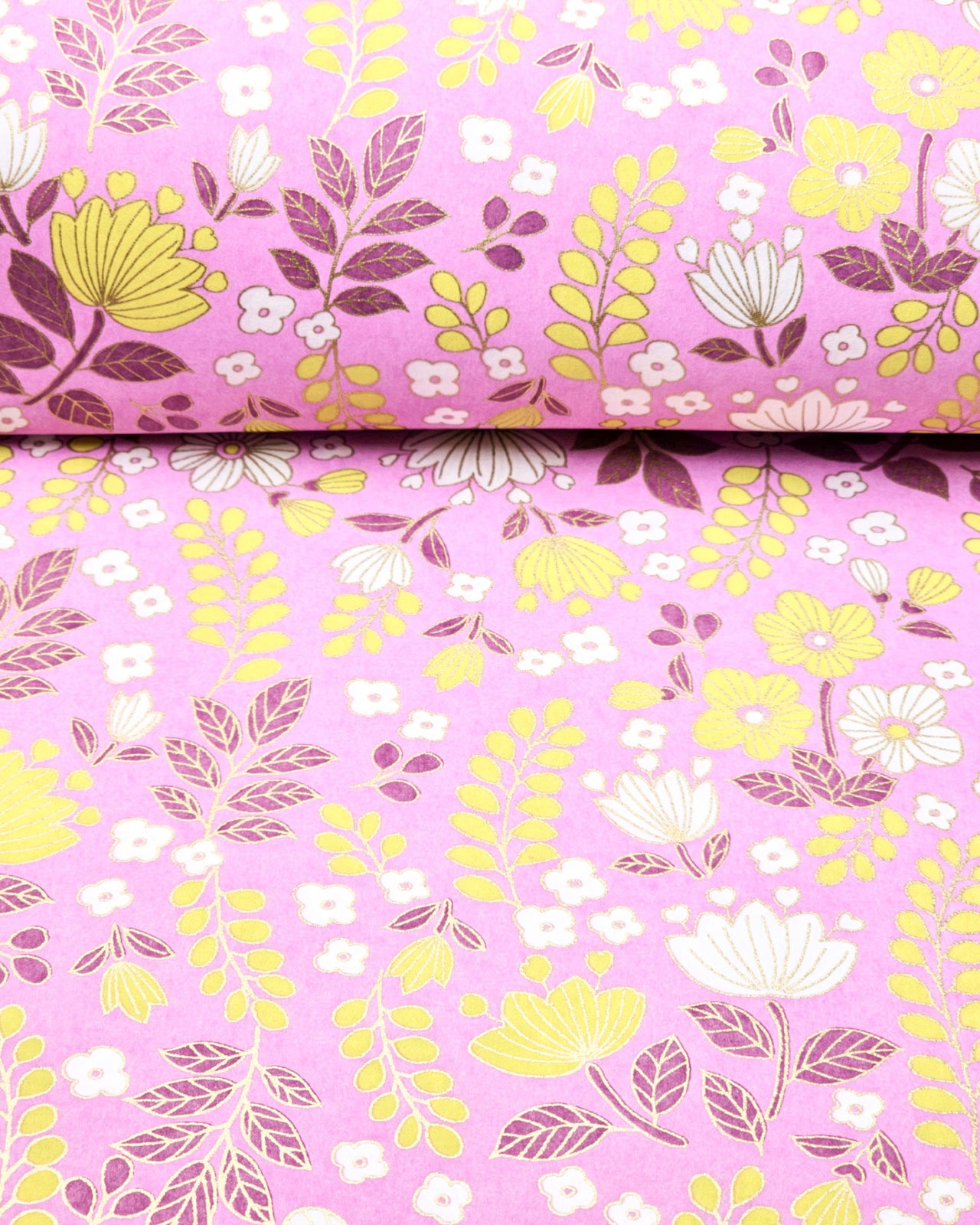 Japanese chiyogami paper featuring white & yellow flowers and wisteria with purple leaves and metallic gold accents.