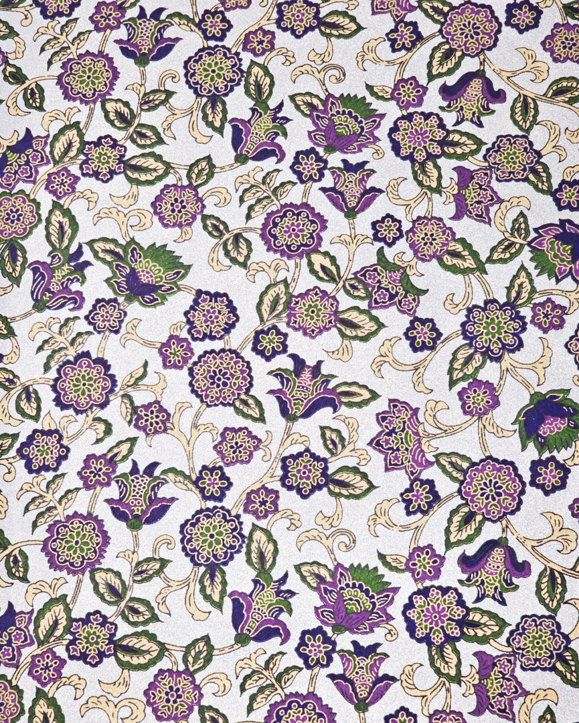 Japanese chiyogami paper featuring purple & green sarasa flowers on a metallic silver background.