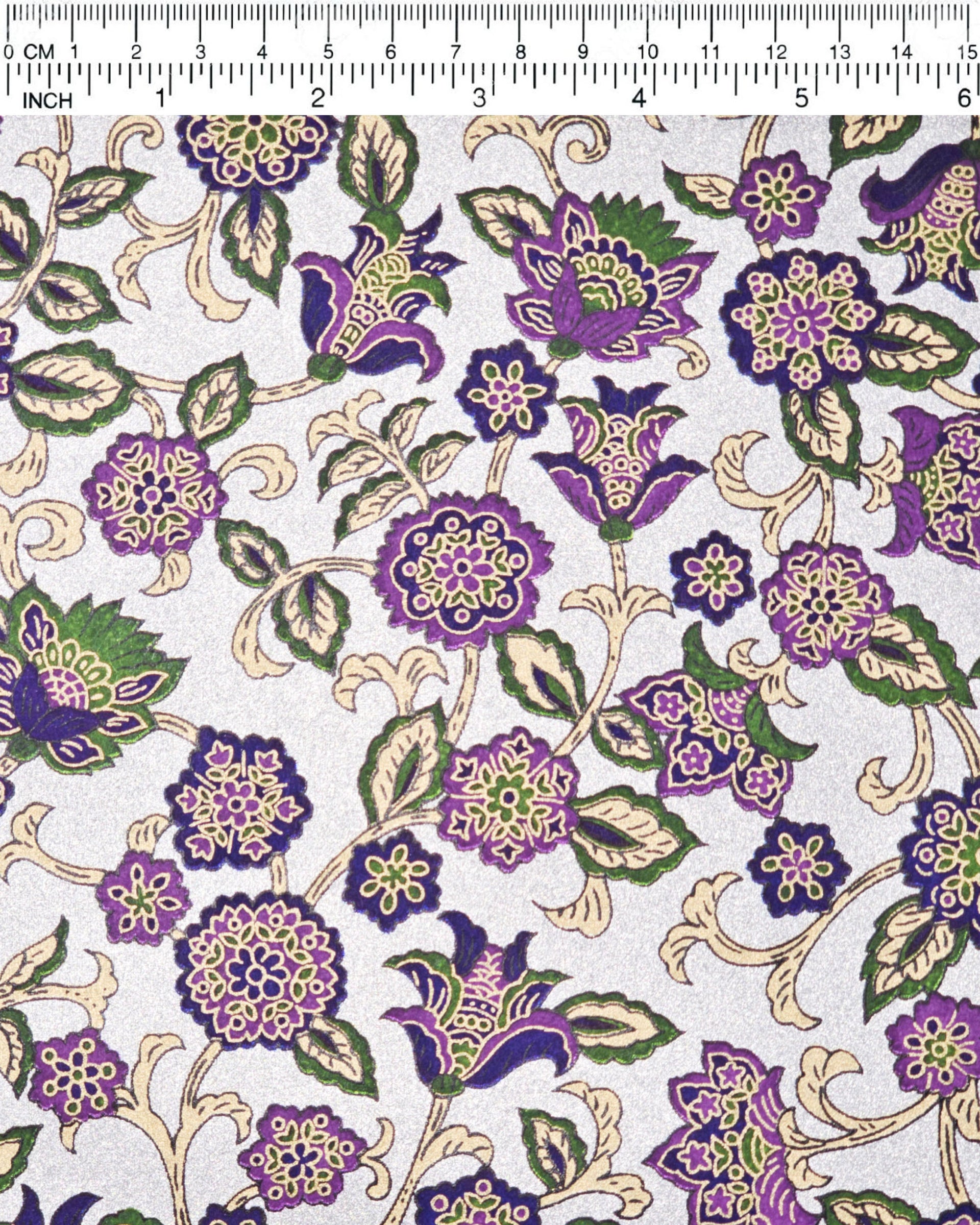 Japanese chiyogami paper featuring purple & green sarasa flowers on a metallic silver background.