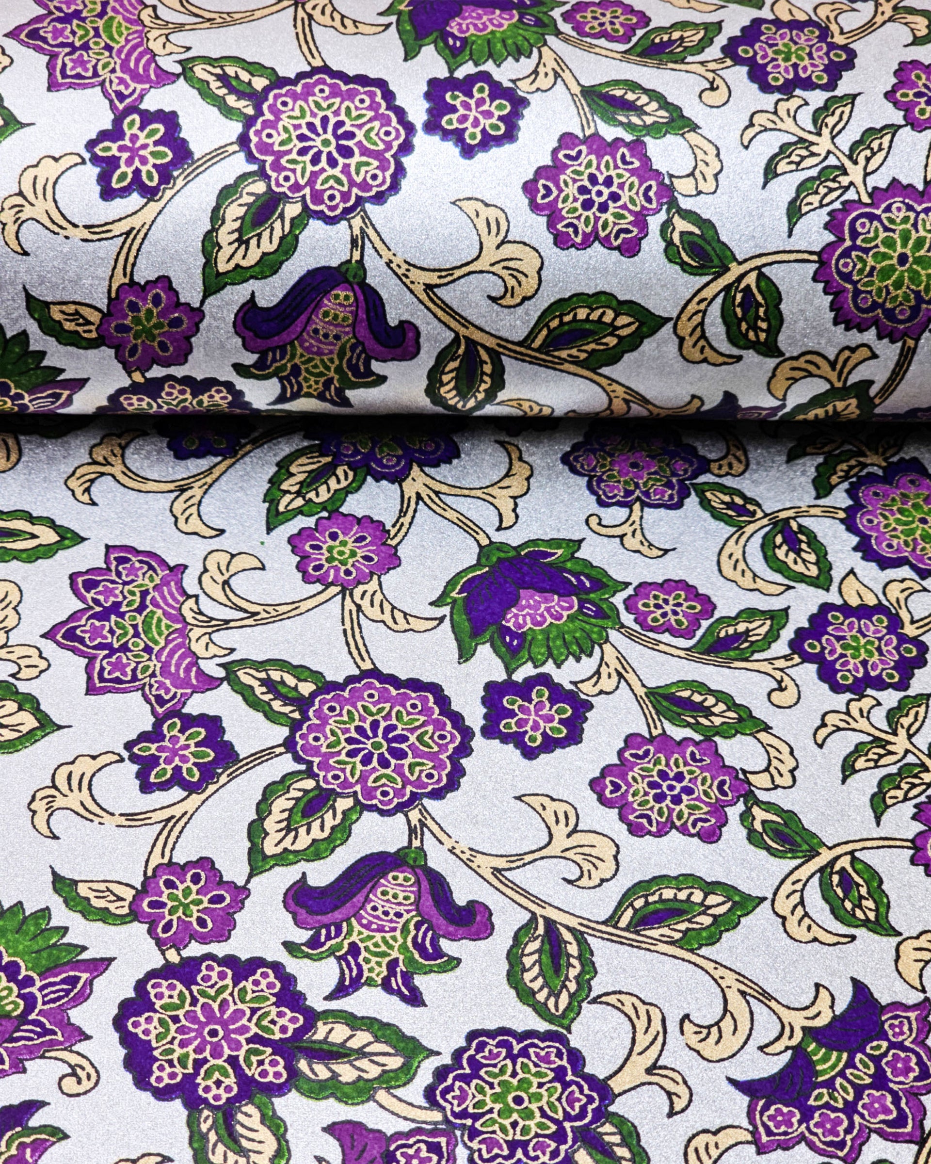 Japanese chiyogami paper featuring purple & green sarasa flowers on a metallic silver background.