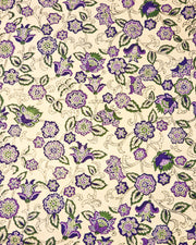 Japanese chiyogami paper featuring purple & green sarasa flowers on a metallic gold background.