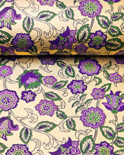 Japanese chiyogami paper featuring purple & green sarasa flowers on a metallic gold background.