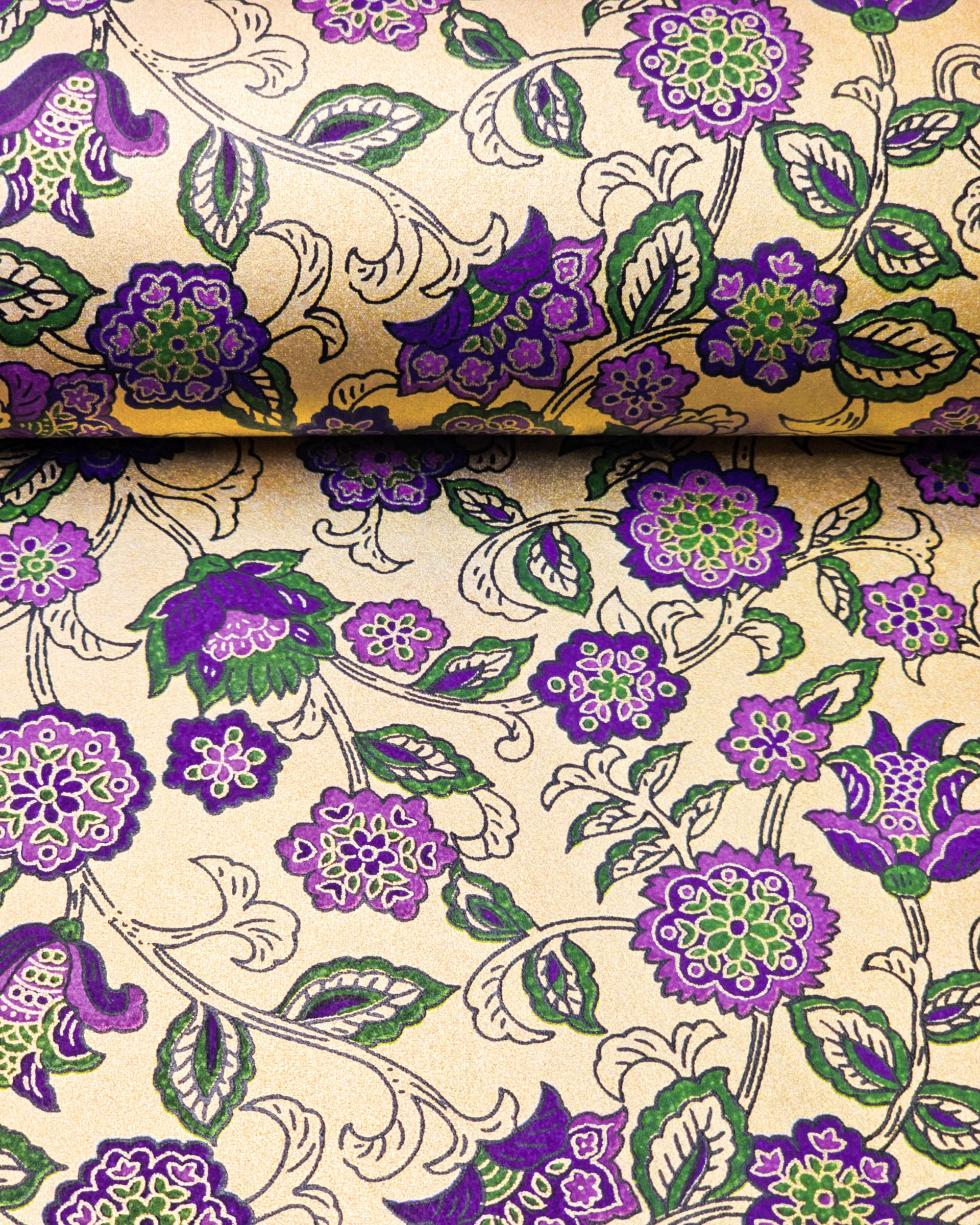 Japanese chiyogami paper featuring purple & green sarasa flowers on a metallic gold background.