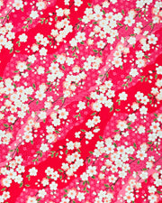 Japanese chiyogami paper featuring pink & white cherry blossoms on a red background with metallic gold accents.