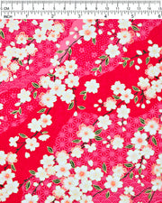 Japanese chiyogami paper featuring pink & white cherry blossoms on a red background with metallic gold accents.