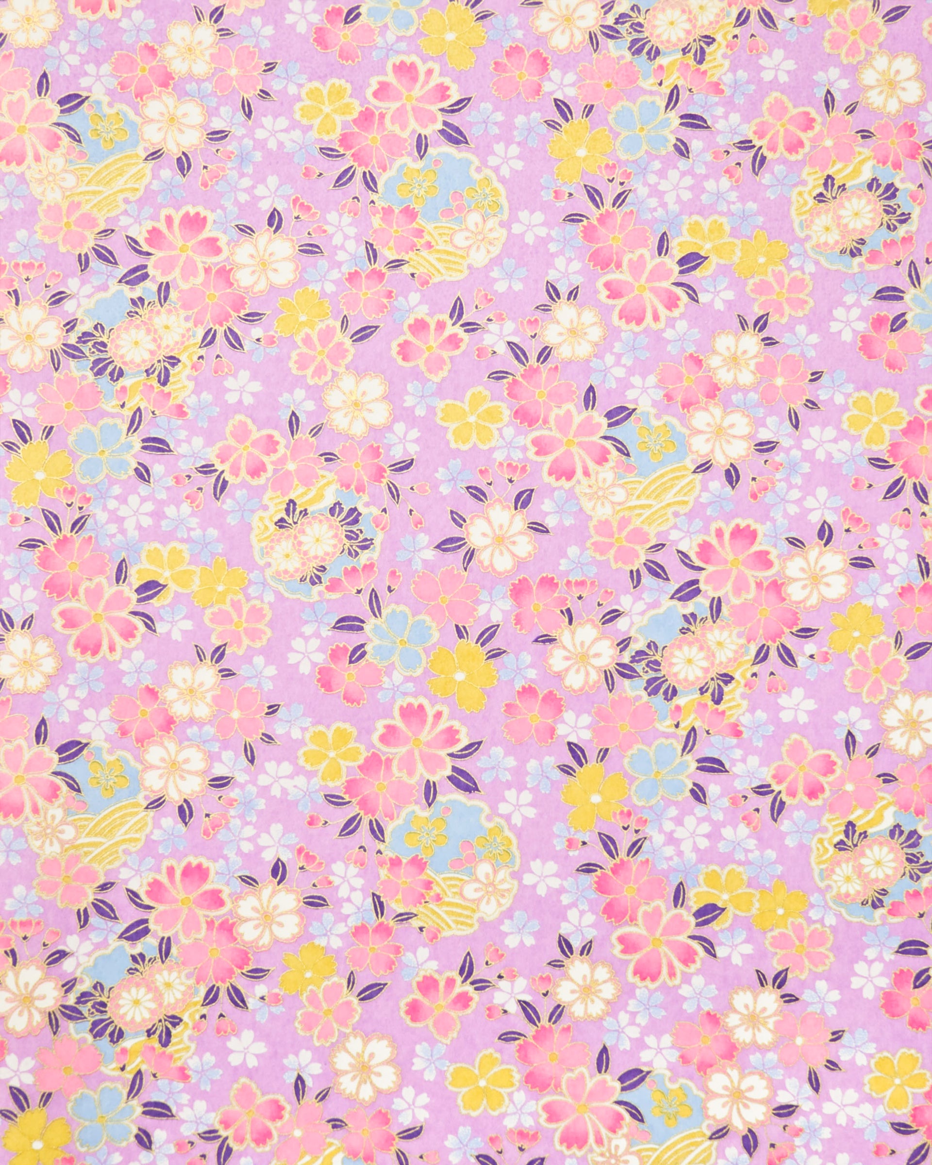 Japanese chiyogami paper featuring pink, yellow, blue, and white cherry blossoms and purple yukiwas on a purple background with metallic gold accents.