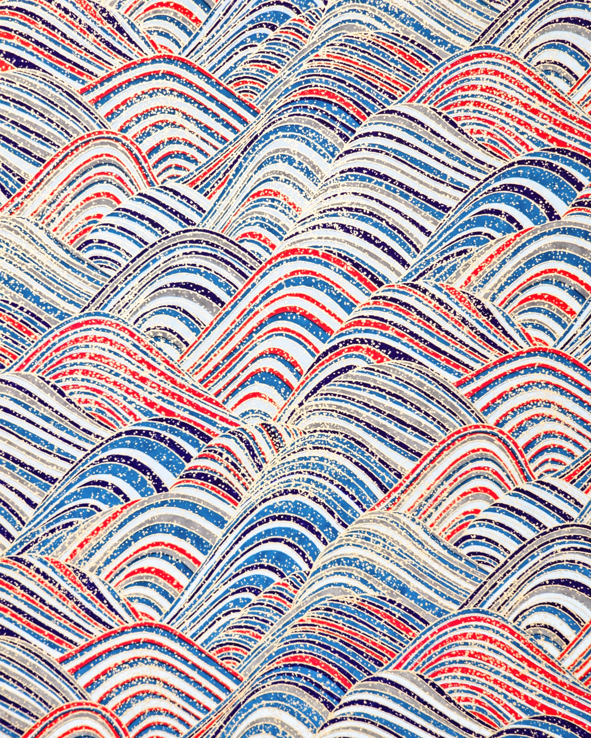 Japanese chiyogami paper featuring blue & red striped hills with metallic gold accents.