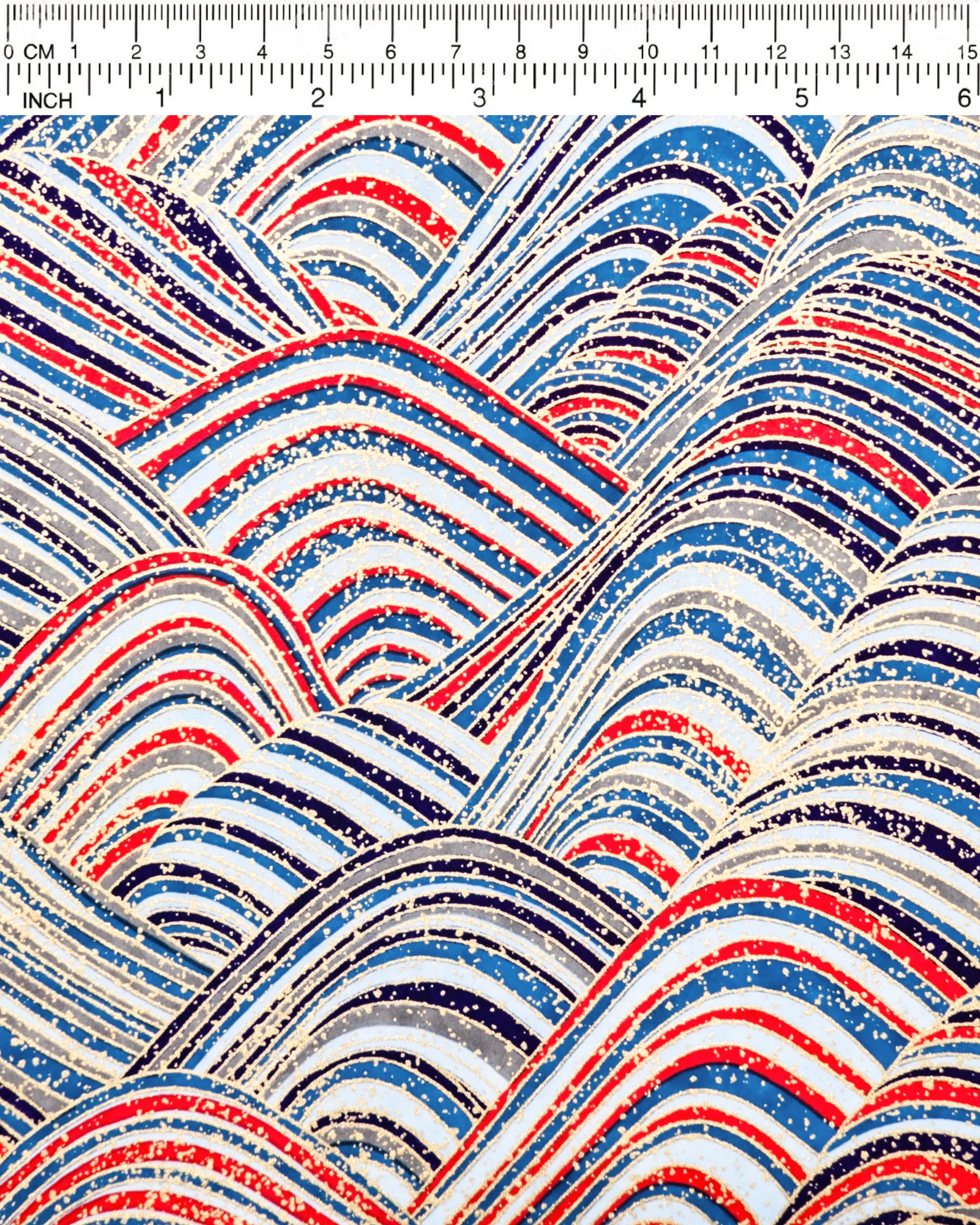 Japanese chiyogami paper featuring blue & red striped hills with metallic gold accents.