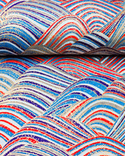 Japanese chiyogami paper featuring blue & red striped hills with metallic gold accents.