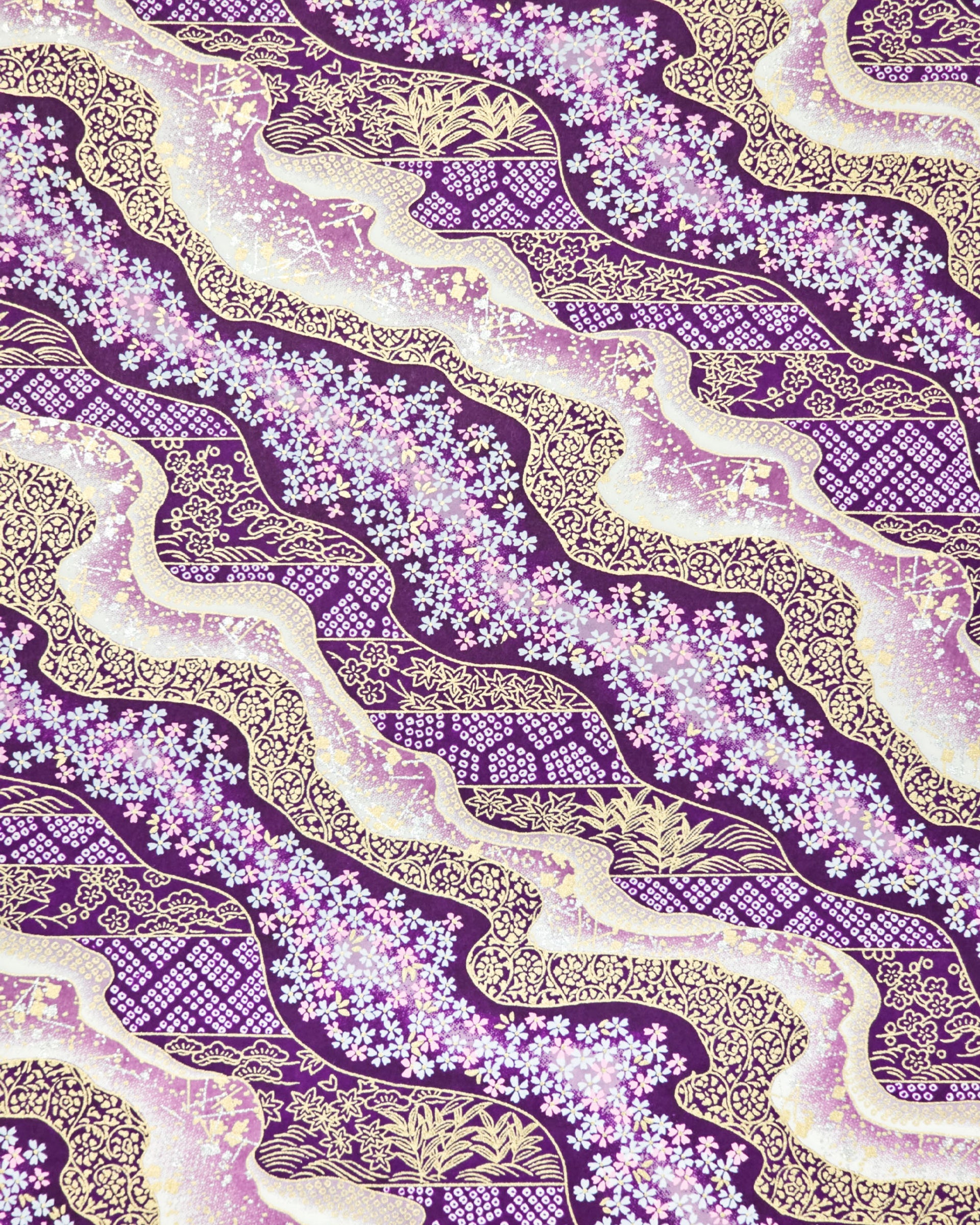 Japanese chiyogami paper featuring pink & white cherry blossoms on purple background with metallic gold & silver accents.