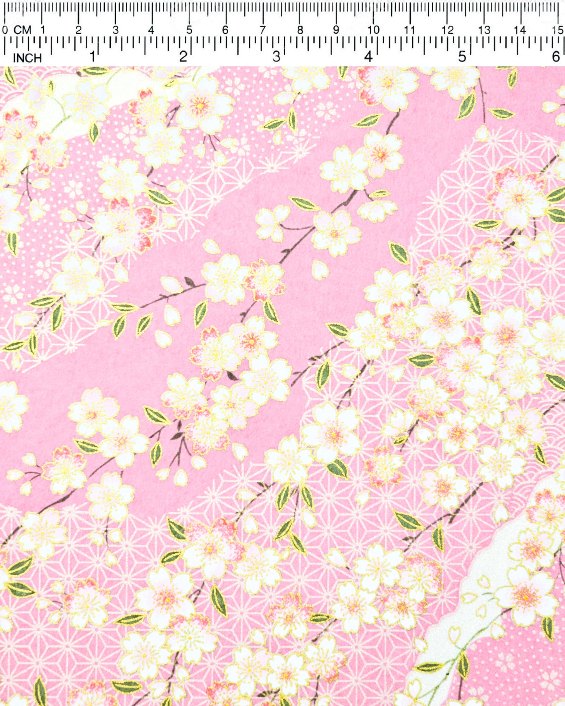 Japanese chiyogami paper featuring pink & white cherry blossoms on light pink background with metallic gold accents.