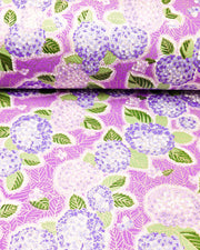 Japanese chiyogami paper featuring purple & blue hydrangeas on a purple background with metallic gold accents.