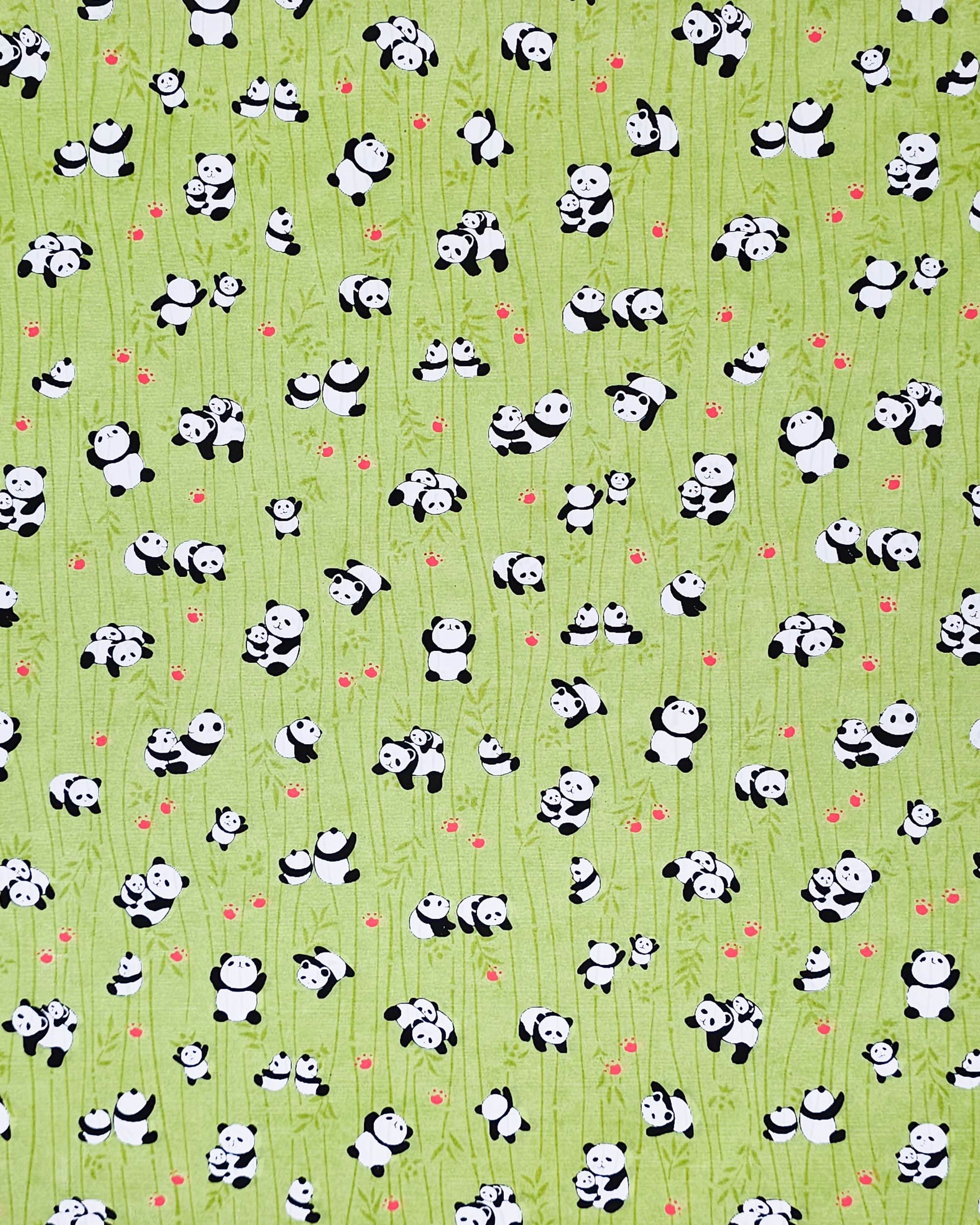 Japanese chiyogami featuring small pandas and small red paw prints on a green background with green bamboo.