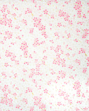 Japanese chiyogami paper featuring white & pink cherry blossoms on a white & light pink background with metallic gold accents.