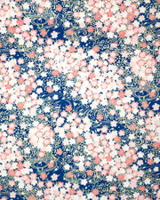Japanese chiyogami featuring pink cherry blossoms on a blue background with metallic gold accents.