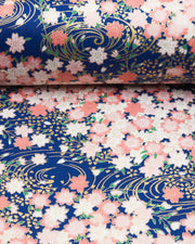 Japanese chiyogami featuring pink cherry blossoms on a blue background with metallic gold accents.