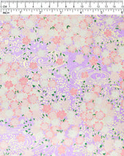 Japanese chiyogami paper featuring pink & white cherry blossoms on a pearlescent purple background with metallic gold accents.