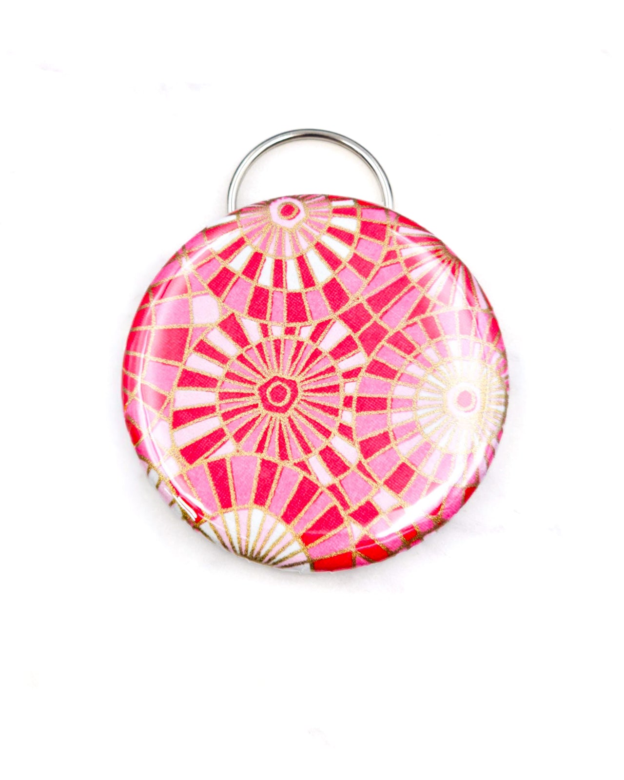 Magnetic bottle opener featuring pink and white abstract parasols with metallic gold accents