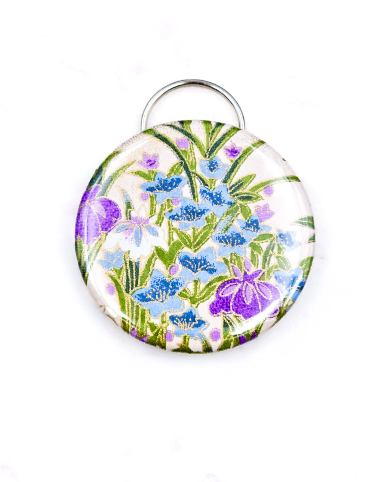 Magnetic bottle opener featuring purple and blue iris flowers on a cream background with metallic gold accents.