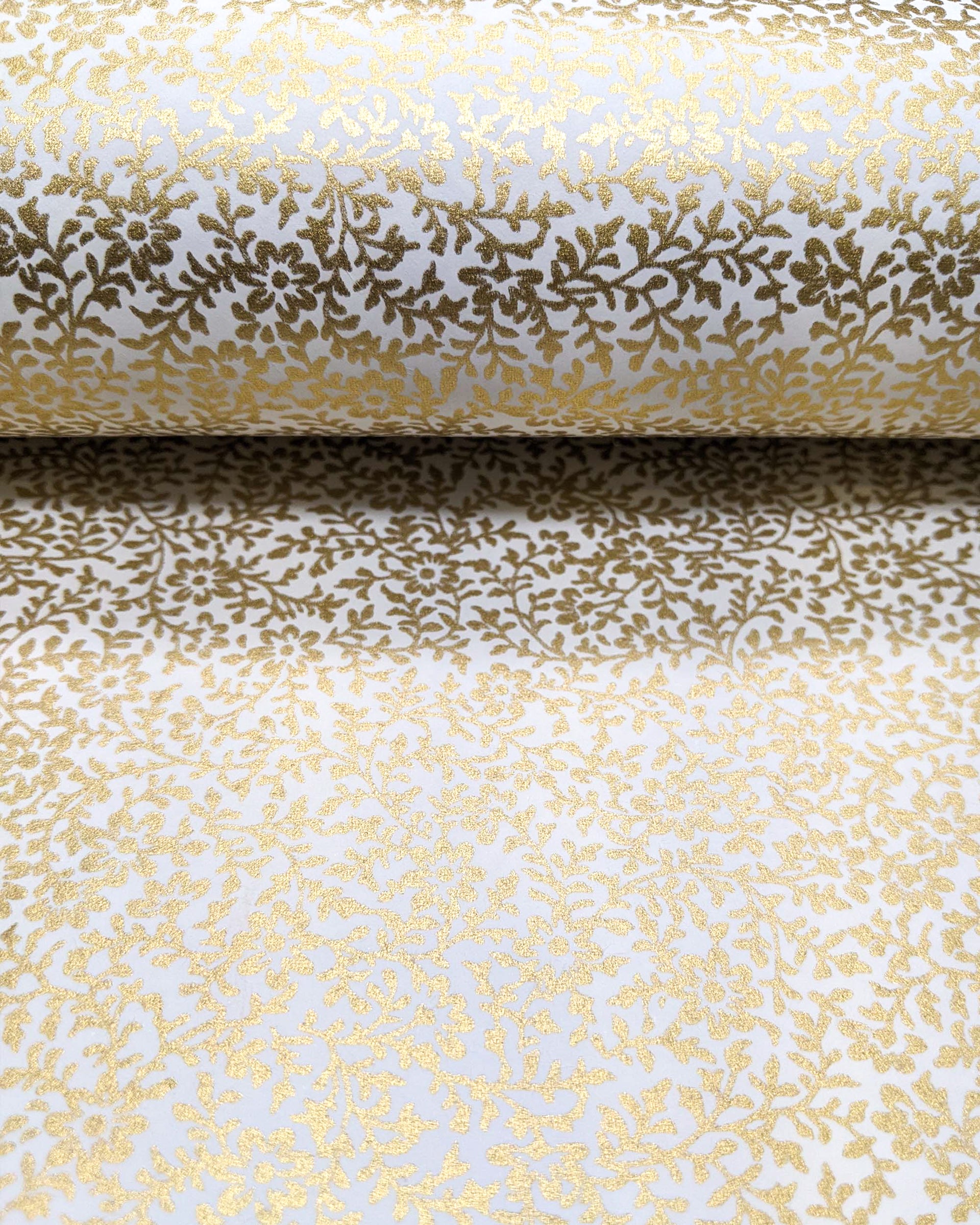 Japanese chiyogami featuring a metallic gold floral design on a white background.