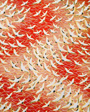 Japanese chiyogami featuring flying white cranes zigzagging on a gold & red background with metallic gold accents.