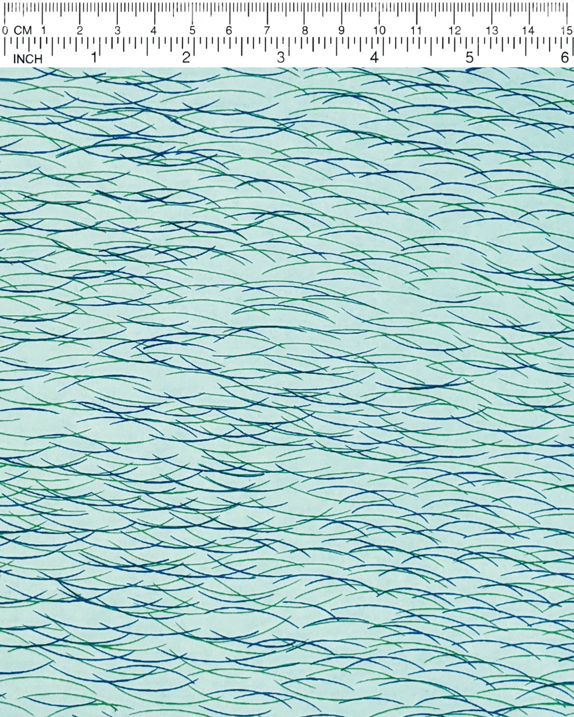 Japanese chiyogami paper featuring dark blue & green lines on a turquoise background.
