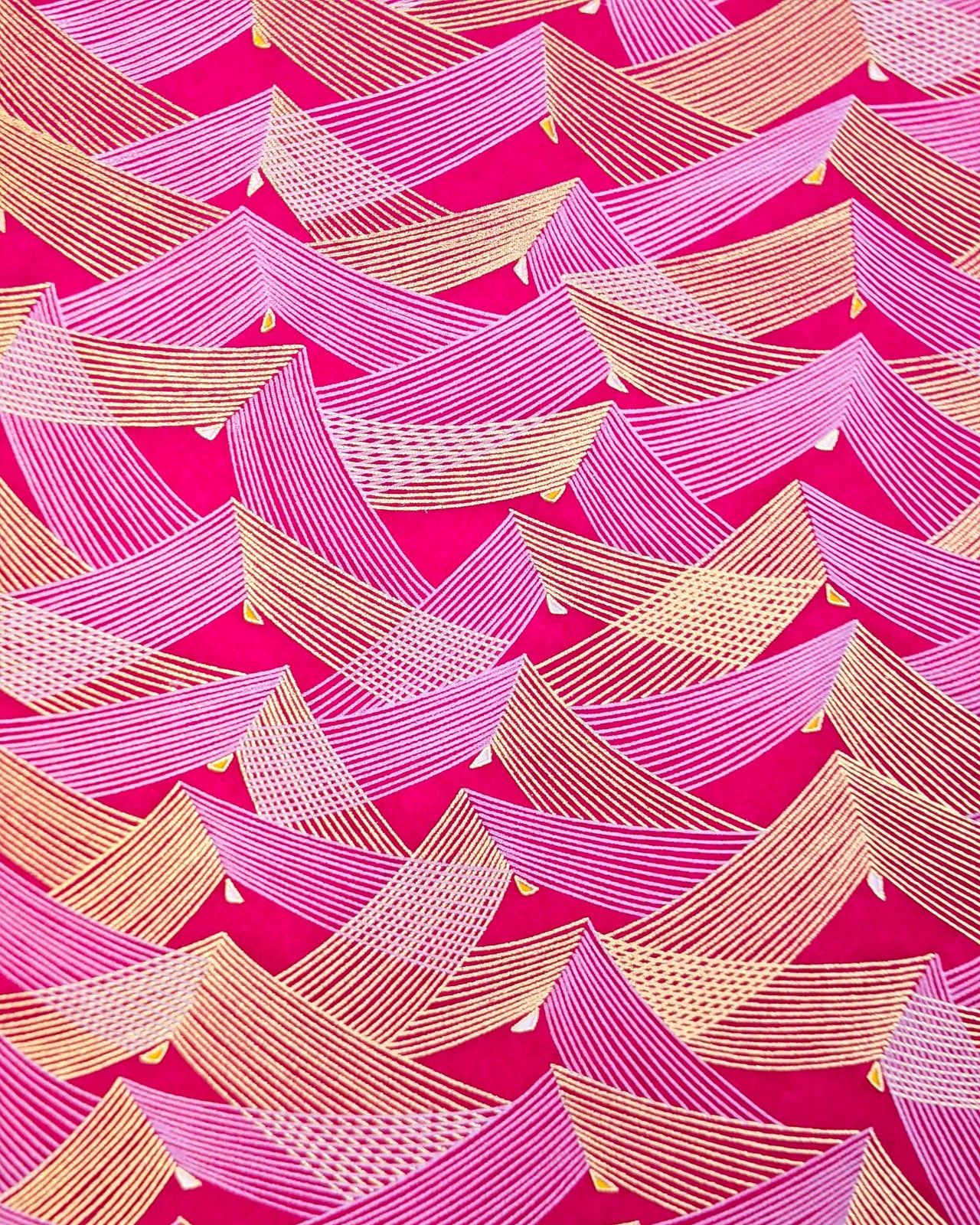 Japanese chiyogami paper featuring metallic gold & white triangles on a magenta pink background.
