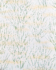 Japanese chiyogami paper featuring small white flower bushes over a light blue background with metallic gold accents.
