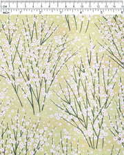 Japanese chiyogami paper featuring small white flower bushes over a yellow green background with metallic gold accents.