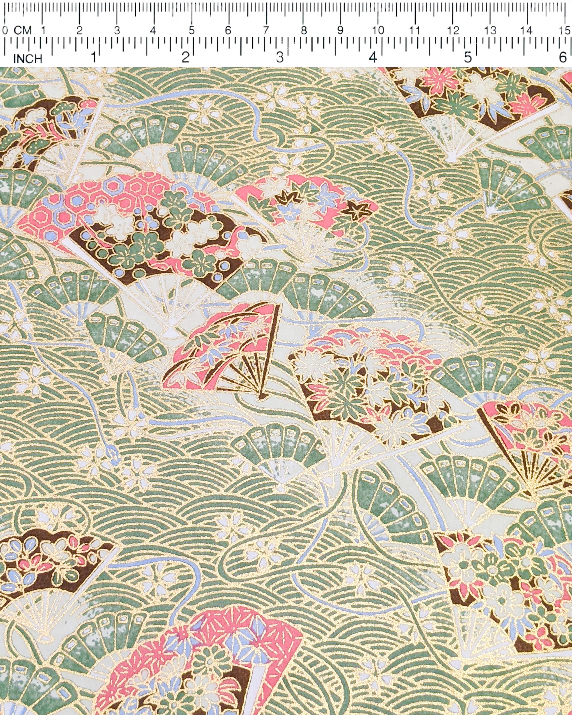 Japanese chiyogami featuring floral hand fans on a green wave crest background with metallic gold accents.
