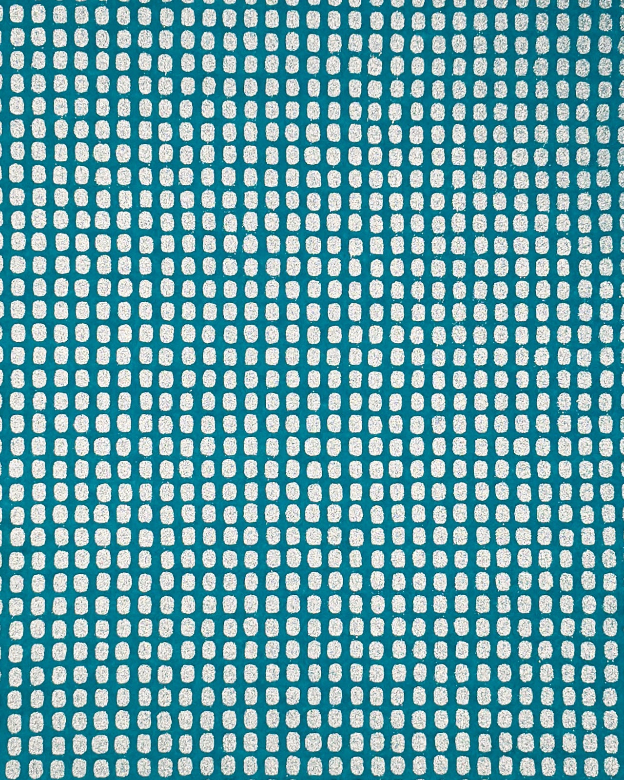 Japanese chiyogami paper featuring metallic silver geometric blocks on a blue background.