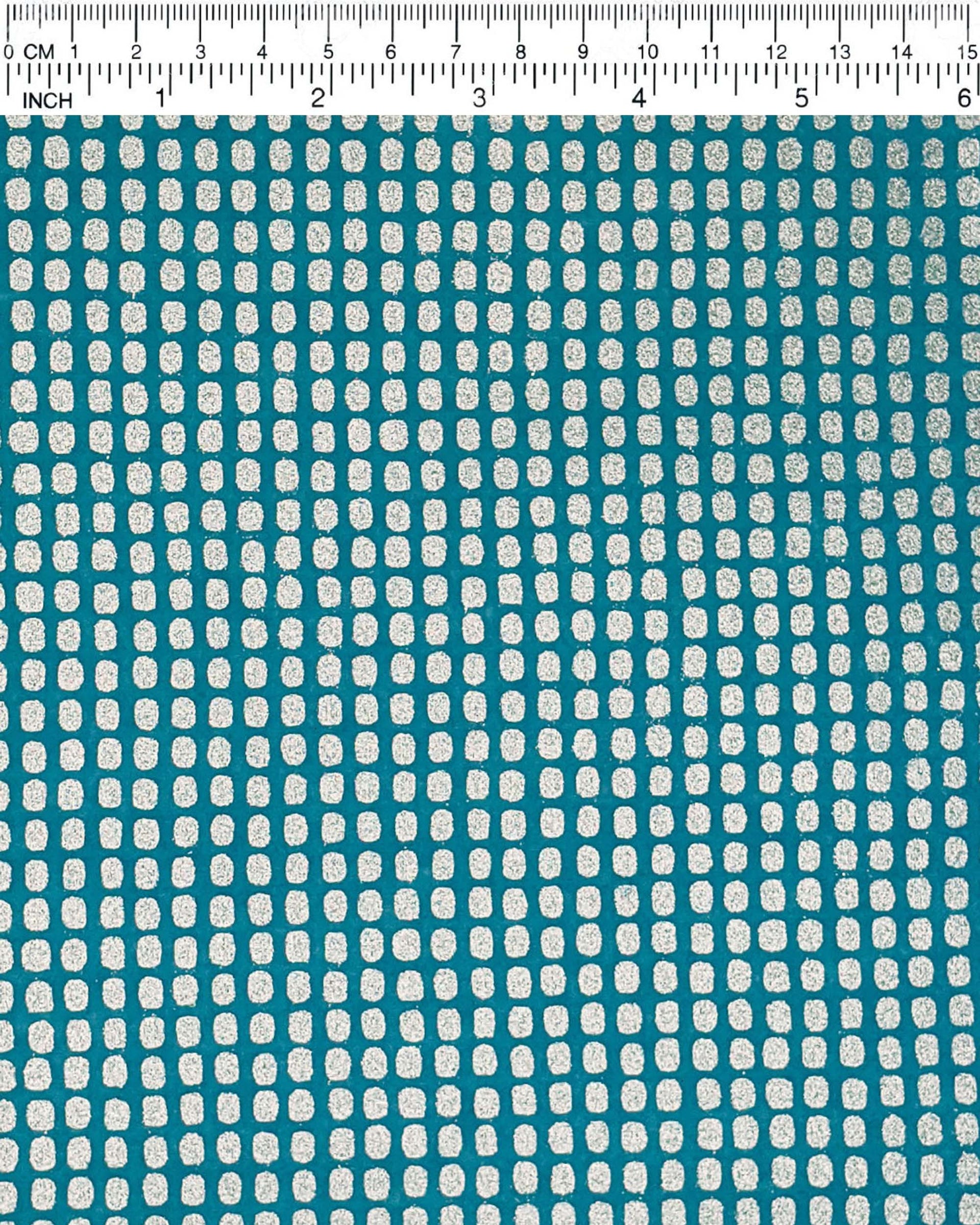 Japanese chiyogami paper featuring metallic silver geometric blocks on a blue background.