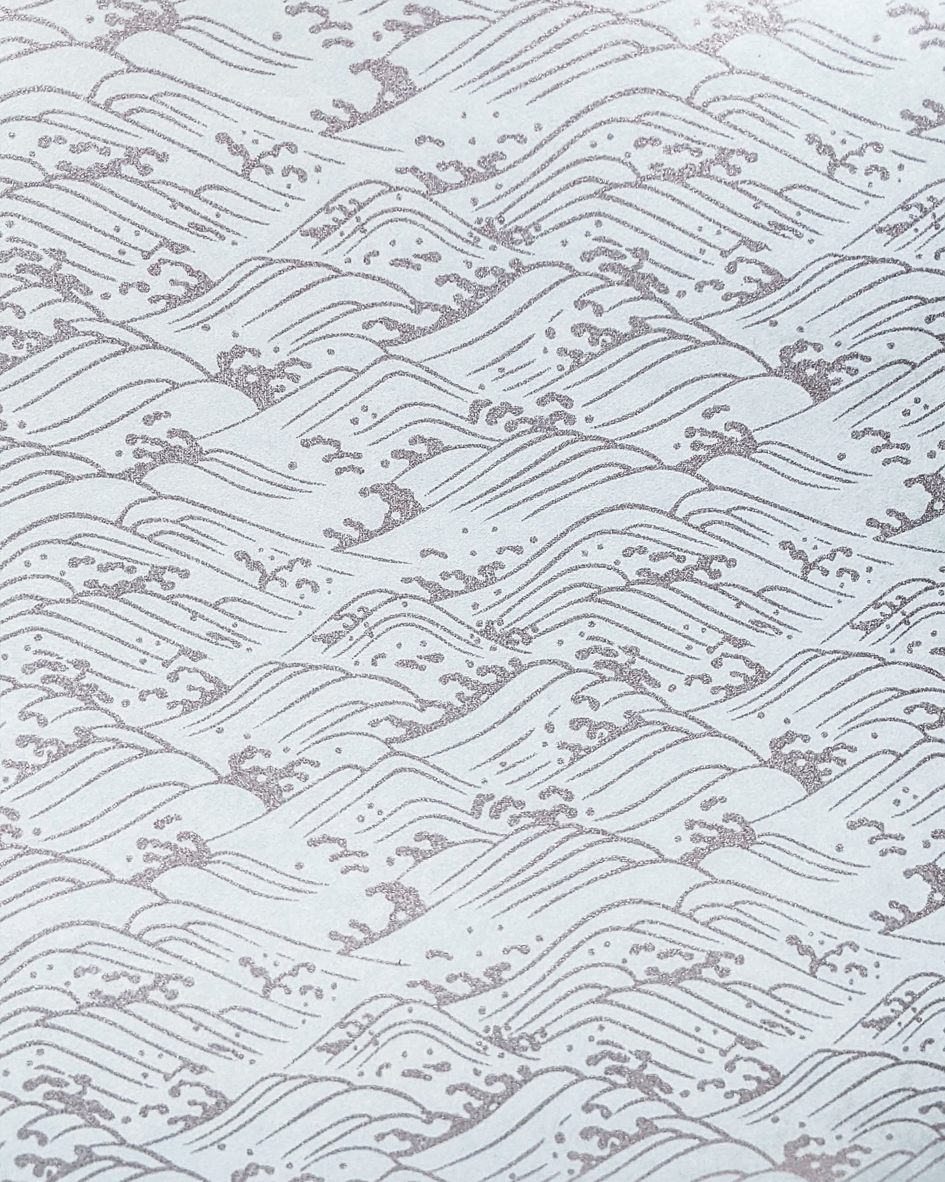 Japanese chiyogami paper featuring metallic silver waves on a light blue background.