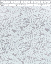 Japanese chiyogami paper featuring metallic silver waves on a light blue background.