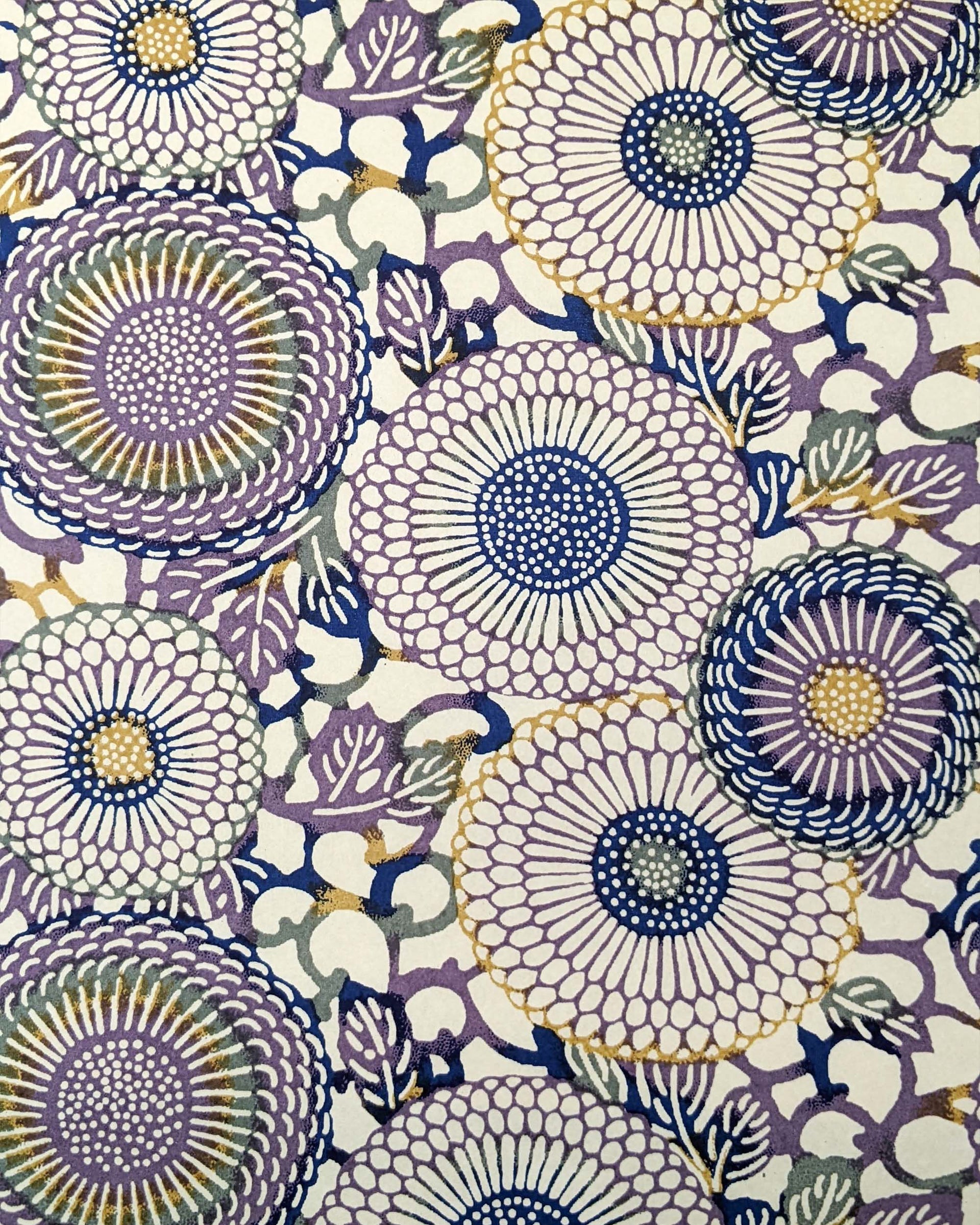 Japanese chiyogami paper featuring large purple & yellow zinnia flowers on a beige background.