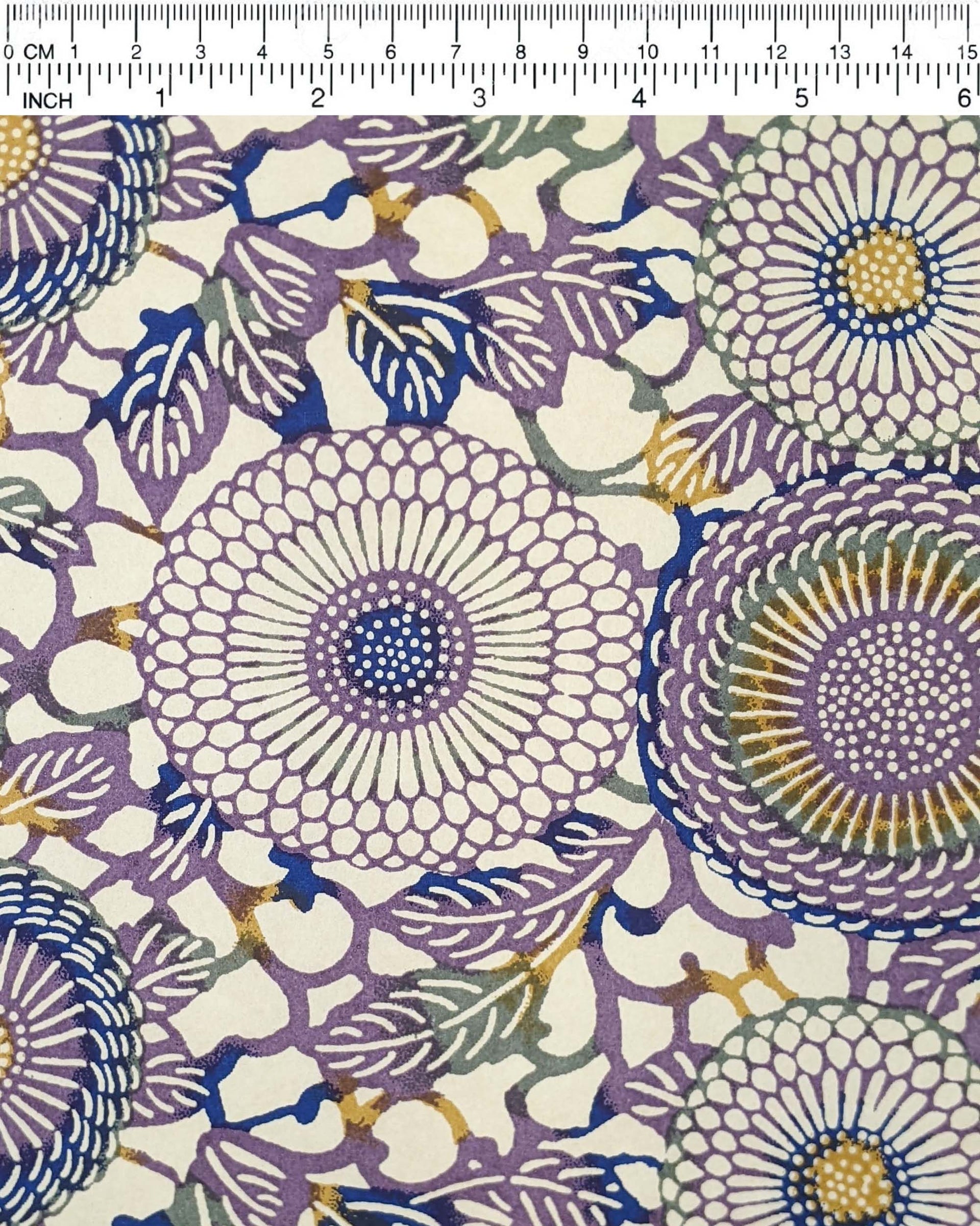 Japanese chiyogami paper featuring large purple & yellow zinnia flowers on a beige background.