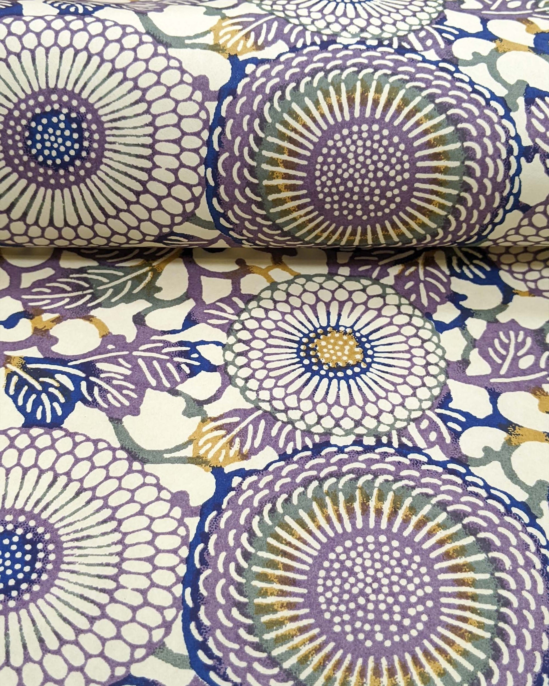 Japanese chiyogami paper featuring large purple & yellow zinnia flowers on a beige background.