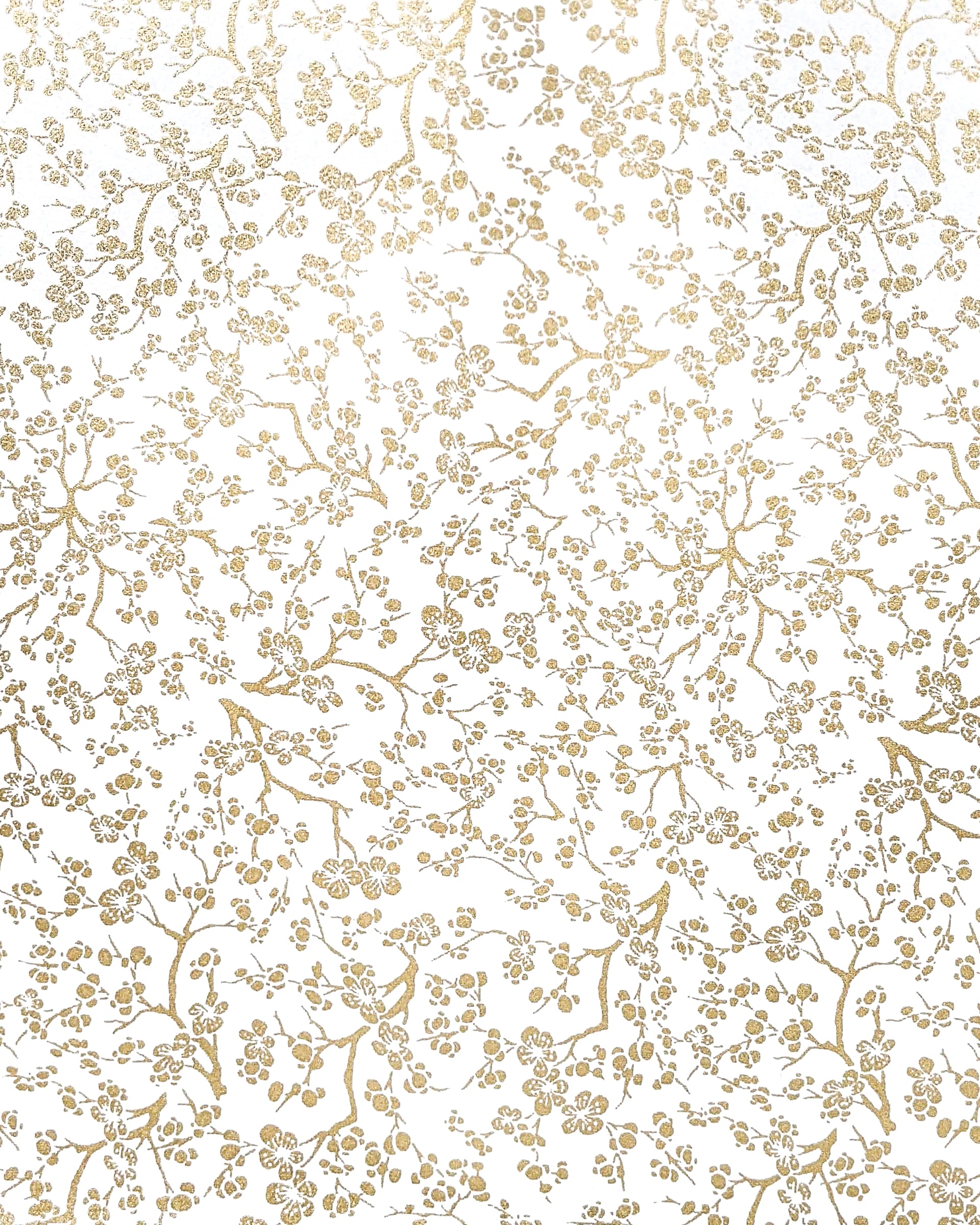 Japanese chiyogami paper featuring small metallic gold plum blossom branches on a white background.