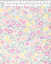 Japanese chiyogami paper featuring purple, pink, and yellow flower stalks on a light blue background with metallic gold accents